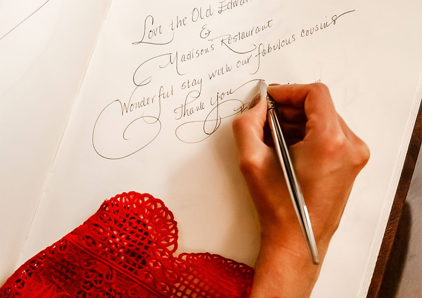 Hand writing a letter